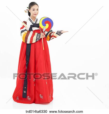 Stock Image - pointing, object, Asian, festival, smile, clothes, fan. Fotosearch