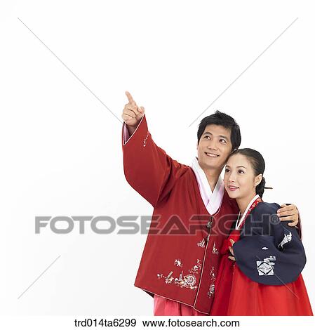 pointing, object, friendly, Asian, festival, smile View Large Photo Image Stock Photo - pointing, object, friendly, Asian, festival, smile. Fotosearch
