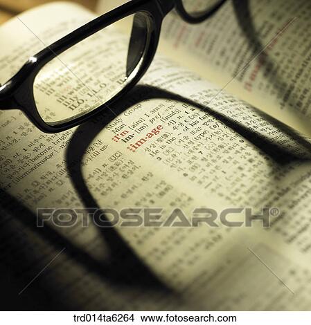shadow, book, dictionary, book, glasses, English dictionarycloseup, study View Large Photo Image Picture - shadow, book, dictionary, book, glasses, English dictionarycloseup, study. Fotosearch
