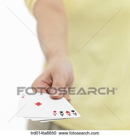 Stock Image - person, body, hand, closeup, card, trumph. Fotosearch