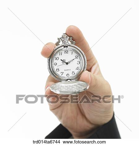 Picture - person, body, hand, closeup, object, antique, pocket watch. Fotosearch