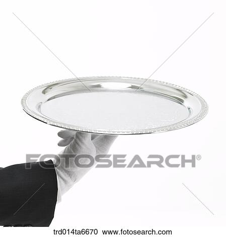 Stock Image - person, body, hand, closeup, object, gloves, silver plate. Fotosearch