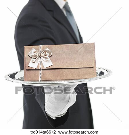 Stock Image - person, body, hand, closeup, object, gloves, silver plate. Fotosearch
