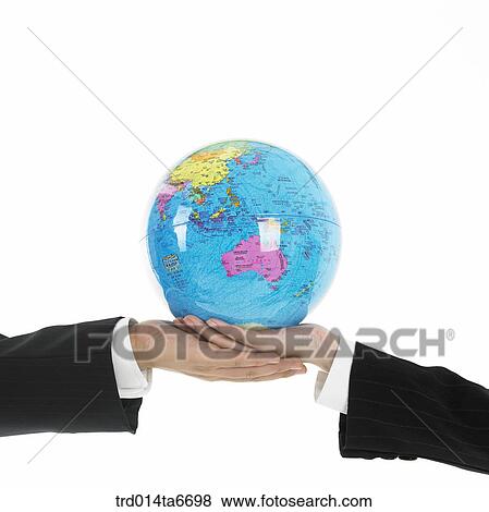 Stock Photo - person, body, hand, closeup, object, globe. Fotosearch