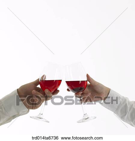 Stock Photograph - person, body, hand, closeup, object, wine, cheers. Fotosearch