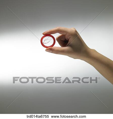 person, body, hand, closeup, object, condom View Large Photo Image Stock Photography - person, body, hand, closeup, object, condom. Fotosearch