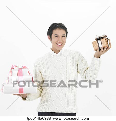 person, Asian, Korean, object, gift, present box View Large Photo Image Stock Photo - person, Asian, Korean, object, gift, present box. Fotosearch
