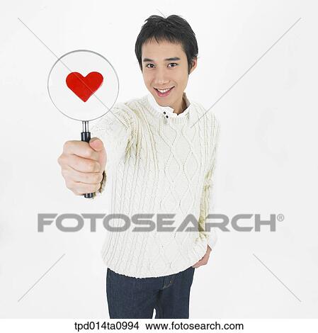 person, Asian, Korean, object, magnifier, heart View Large Photo Image Picture - person, Asian, Korean, object, magnifier, heart. Fotosearch
