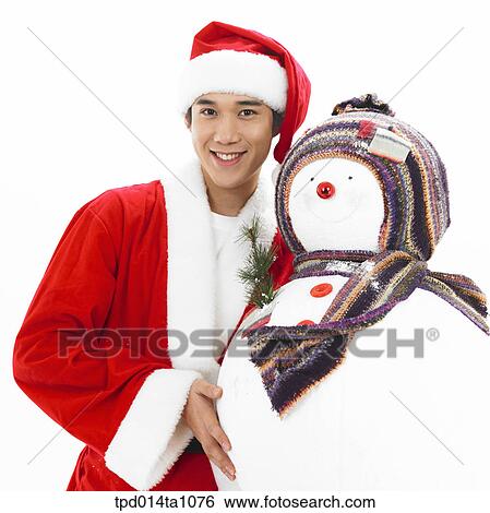 Stock Photograph - person, Asian, Korean, object, Santa, Santa Claus. Fotosearch