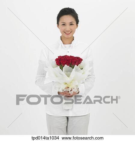 person, Asian, Korean, woman, object, bouquet, rose View Large Photo Image Picture - person, Asian, Korean, woman, object, bouquet, rose. Fotosearch