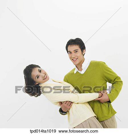 person, Asian, Korean, woman, object, couple View Large Photo Image Stock Photo - person, Asian, Korean, woman, object, couple. Fotosearch