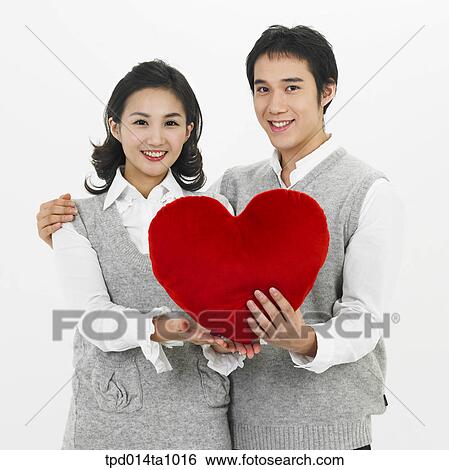 Stock Photograph - person, Asian, Korean, woman, object, couple. Fotosearch
