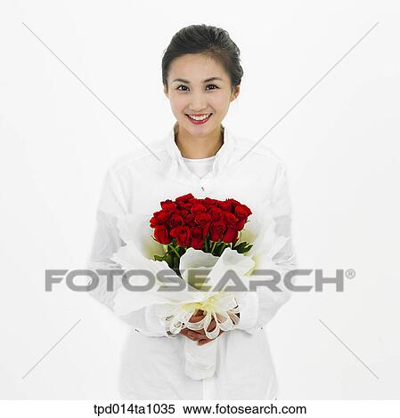 Stock Photography - person, Asian, Korean, woman, object, bouquet, rose. Fotosearch