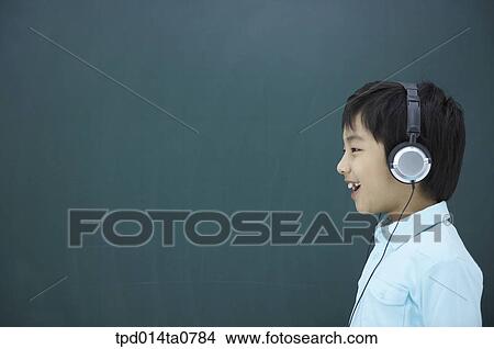 classroom, education, Asian, hearing, smile, person View Large Photo Image Picture - classroom, education, Asian, hearing, smile, person. Fotosearch