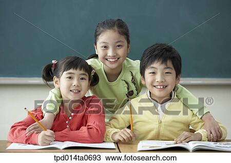 classroom, education, Asian, smile, person, inside View Large Photo Image Stock Image - classroom, education, Asian, smile, person, inside. Fotosearch