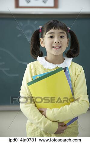 classroom, education, Asian, smile, person, bust, inside View Large Photo Image Stock Image - classroom, education, Asian, smile, person, bust, inside. Fotosearch