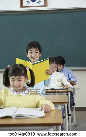 classroom, education, Asian, smile, announcement, person View Large Photo Image Stock Image - classroom, education, Asian, smile, announcement, person. Fotosearch
