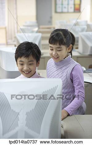 classroom, education, Asian, smile, person, inside View Large Photo Image Stock Photo - classroom, education, Asian, smile, person, inside. Fotosearch