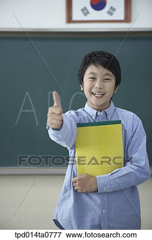 classroom, education, Asian, smile, person, inside View Large Photo Image Stock Photo - classroom, education, Asian, smile, person, inside. Fotosearch