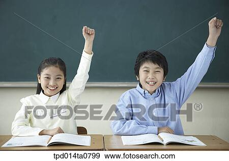 Stock Photo - classroom, education, Asian, smile, announcement, person. Fotosearch