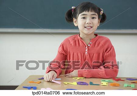 classroom, education, Asian, smile, person, inside, alphabet View Large Photo Image Stock Photograph - classroom, education, Asian, smile, person, inside, alphabet. Fotosearch