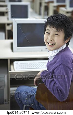 Stock Image - classroom, education, turning back, Asian, person, inside. Fotosearch