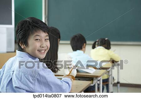 classroom, education, turning back, Asian, person, school hours View Large Photo Image Stock Photo - classroom, education, turning back, Asian, person, school hours. Fotosearch