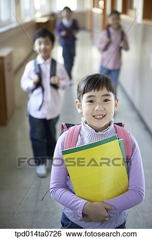 Stock Photograph - education, group, Asian, smile, hallway, person. Fotosearch