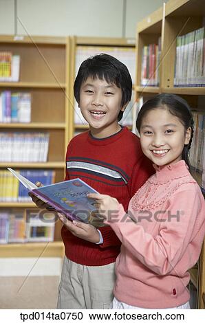 education, library, reading, Asian, smile, person View Large Photo Image Stock Image - education, library, reading, Asian, smile, person. Fotosearch