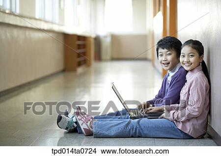 education, notebook, Asian, smile, hallway, person View Large Photo Image Picture - education, notebook, Asian, smile, hallway, person. Fotosearch