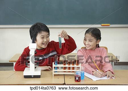 Stock Image - science, laboratory, classroom, education, Asian, person. Fotosearch