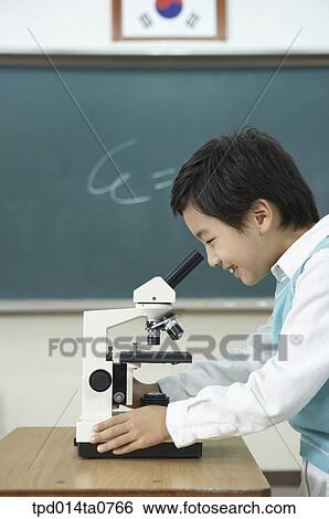 science, observation, classroom, education, Asian, smile View Large Photo Image Stock Photograph - science, observation, classroom, education, Asian, smile. Fotosearch