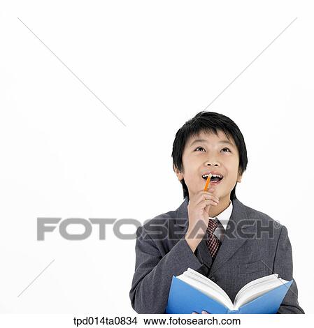 education, object, Asian, smile, person, thought View Large Photo Image Picture - education, object, Asian, smile, person, thought. Fotosearch