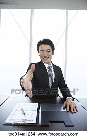 person, Asian, Korean, inside, business, businessman View Large Photo Image Picture - person, Asian, Korean, inside, business, businessman. Fotosearch