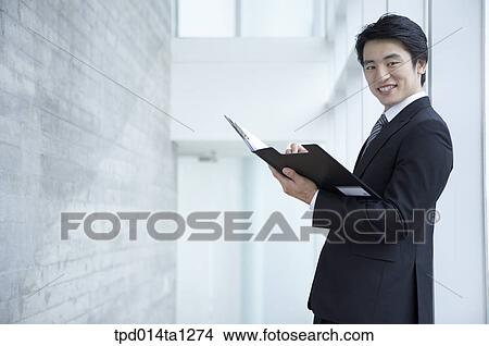 person, Asian, Korean, inside, business, businessman View Large Photo Image Picture - person, Asian, Korean, inside, business, businessman. Fotosearch