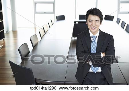 Stock Image - person, Asian, Korean, inside, business, businessman. Fotosearch