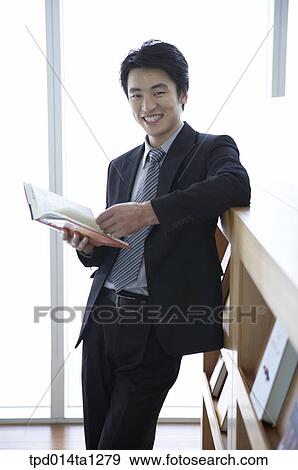 Stock Photo - person, Asian, Korean, inside, business, businessman. Fotosearch