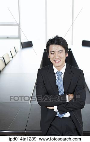 Stock Photo - person, Asian, Korean, inside, business, businessman. Fotosearch
