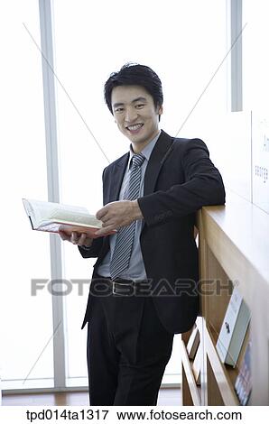 person, Asian, Korean, inside, business, businessman View Large Photo Image Stock Photo - person, Asian, Korean, inside, business, businessman. Fotosearch