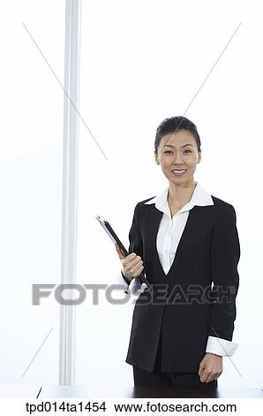person, Asian, Korean, woman, inside, business, businesswoman View Large Photo Image Picture - person, Asian, Korean, woman, inside, business, businesswoman. Fotosearch