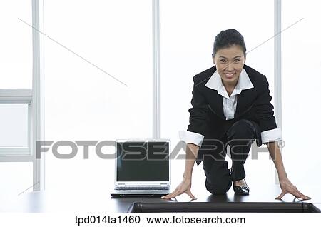 Stock Image - person, Asian, Korean, woman, inside, business, businesswoman. Fotosearch