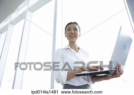 person, Asian, Korean, woman, inside, business, businesswoman View Large Photo Image Stock Image - person, Asian, Korean, woman, inside, business, businesswoman. Fotosearch