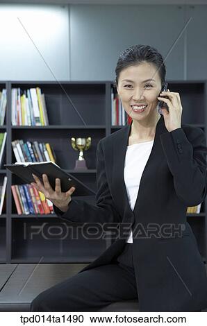 person, Asian, Korean, woman, inside, business, businesswoman View Large Photo Image Stock Image - person, Asian, Korean, woman, inside, business, businesswoman. Fotosearch