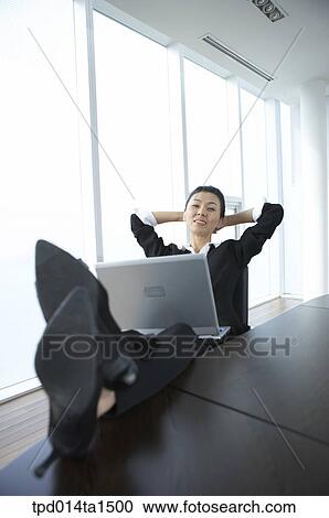 Stock Image - person, Asian, Korean, woman, inside, business, businesswoman. Fotosearch