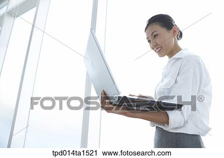 person, Asian, Korean, woman, inside, business, businesswoman View Large Photo Image Stock Image - person, Asian, Korean, woman, inside, business, businesswoman. Fotosearch