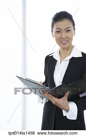 person, Asian, Korean, woman, inside, business, businesswoman View Large Photo Image Stock Photograph - person, Asian, Korean, woman, inside, business, businesswoman. Fotosearch