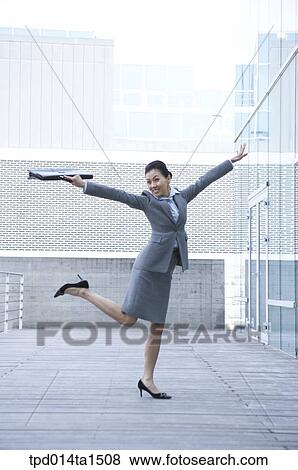Stock Photo - person, Asian, Korean, woman, outside, day, daytime. Fotosearch