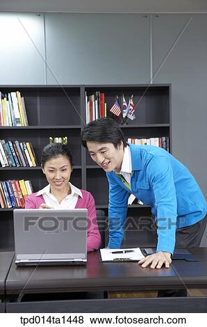 person, Asian, Korean, woman, inside, business View Large Photo Image Stock Photo - person, Asian, Korean, woman, inside, business. Fotosearch