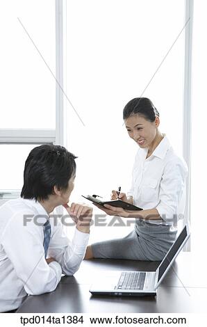 Picture - person, Asian, Korean, woman, colleague, inside. Fotosearch