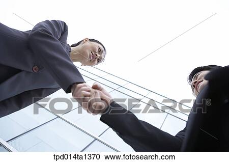 Stock Image - person, Asian, Korean, woman, colleague, outside. Fotosearch